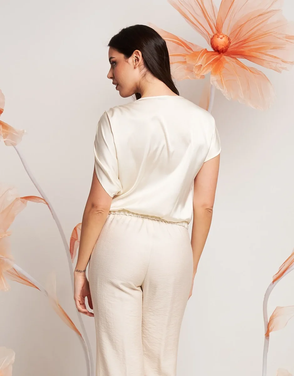 Casacca asimmetrica con paillettes e fiocco - immagine 6